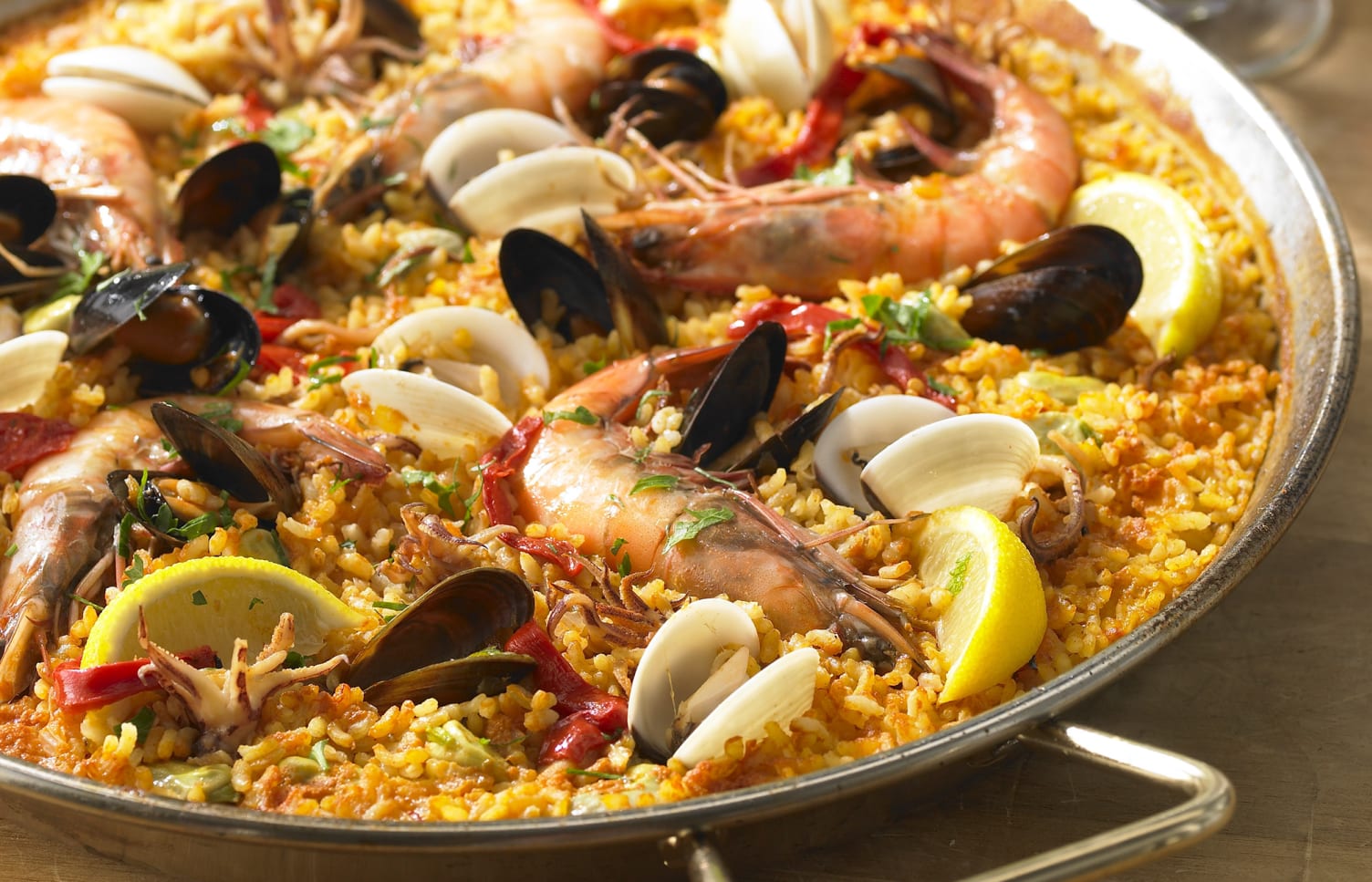 a pan of mixed seafood paella
