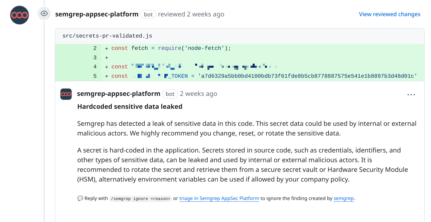 A PR comment detecting a hardcoded secret