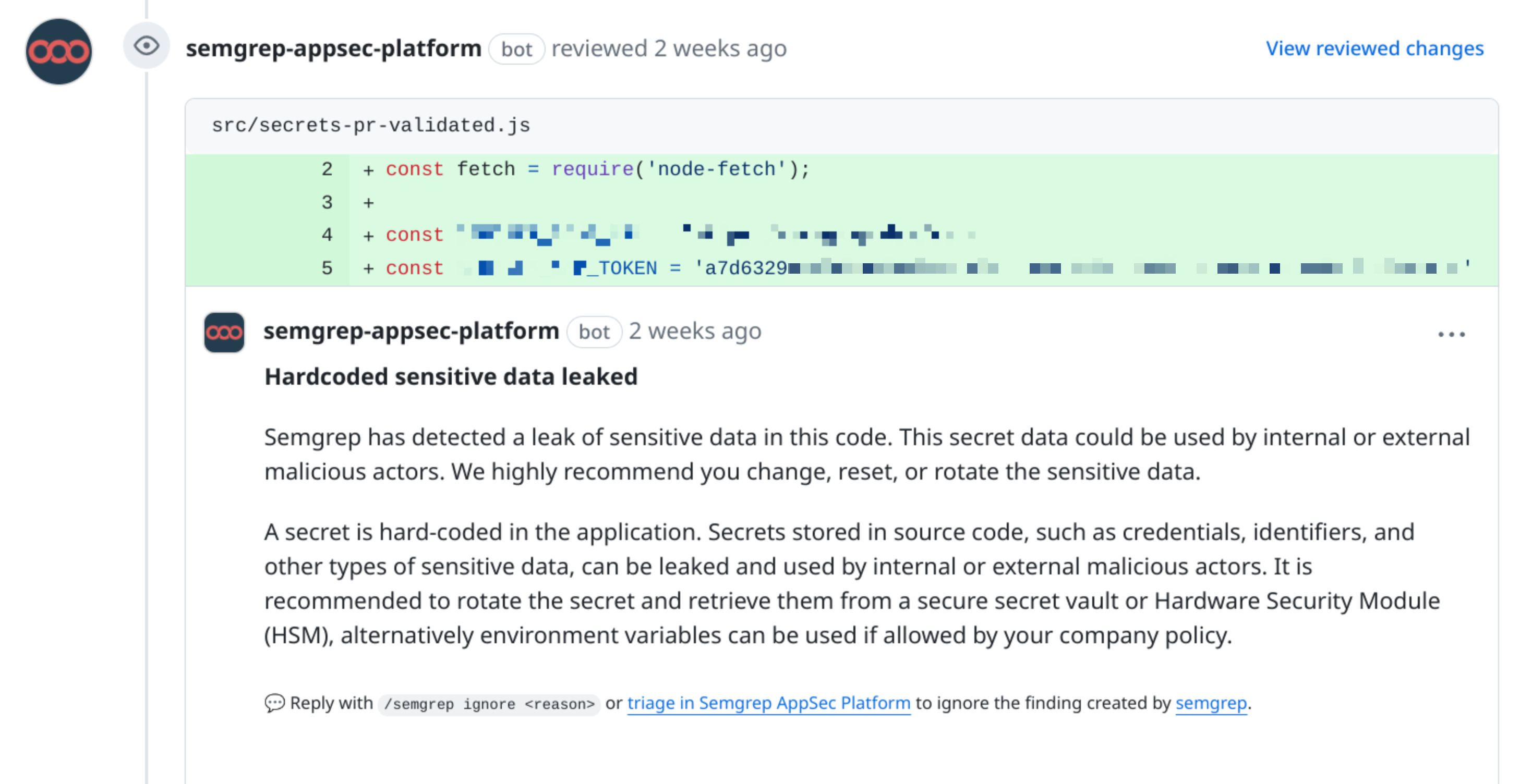 A PR comment detecting a hardcoded secret